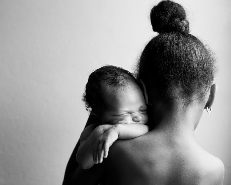 Mother holding baby