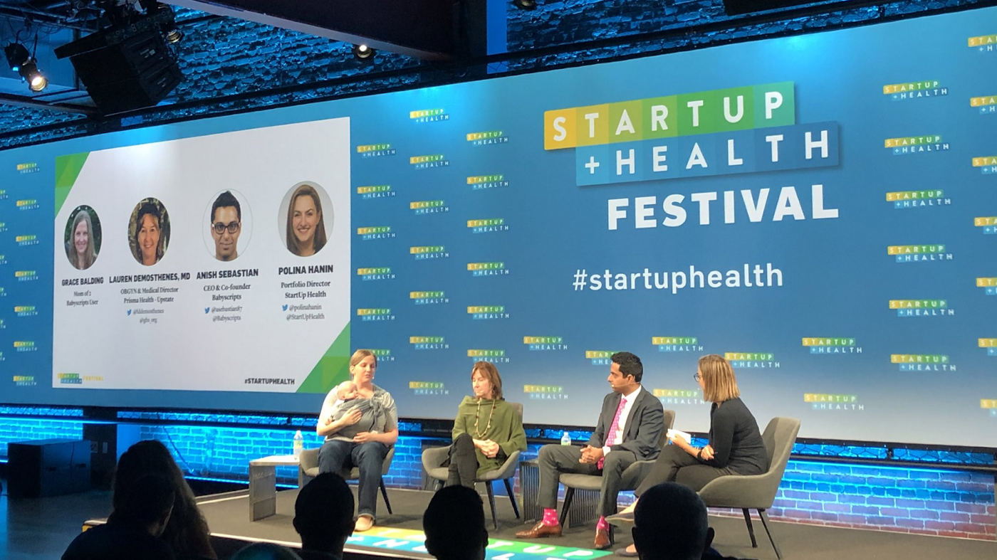 Babyscripts User, Grace (and baby, Aidan) sharing her experience on the program at the StartUp Health Festival.