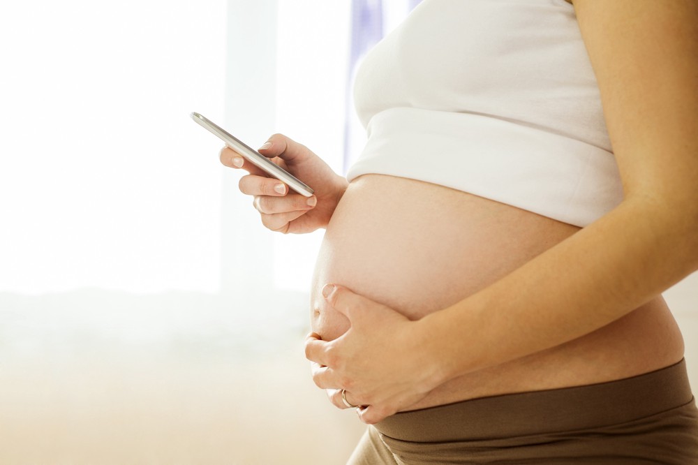 Pregnant Mother with iPhone