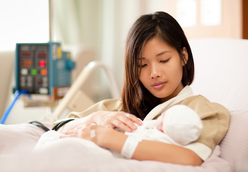 Mother and baby after healthy delivery in hospital