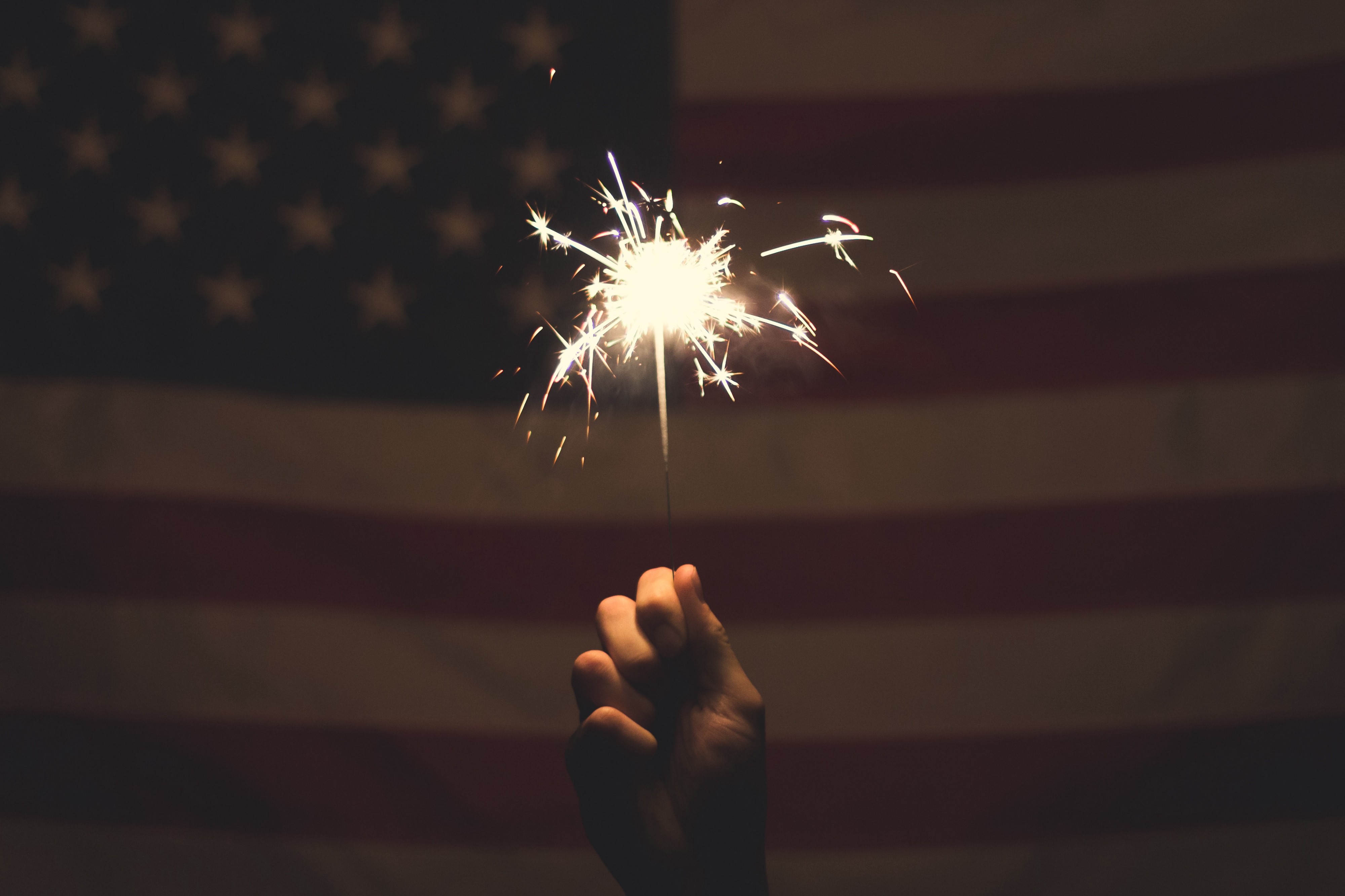 sparkler and American flag