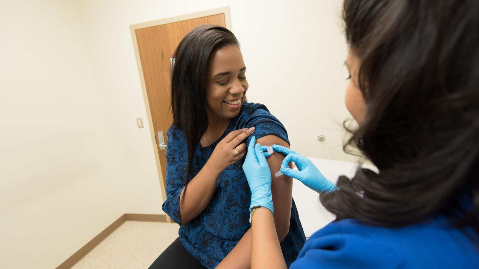 Woman getting vaccine 