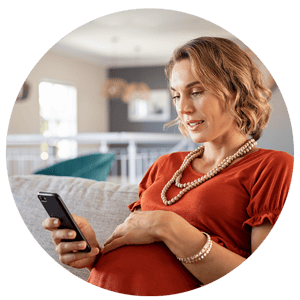 Pregnant patient using phone Pregnant patient using phone