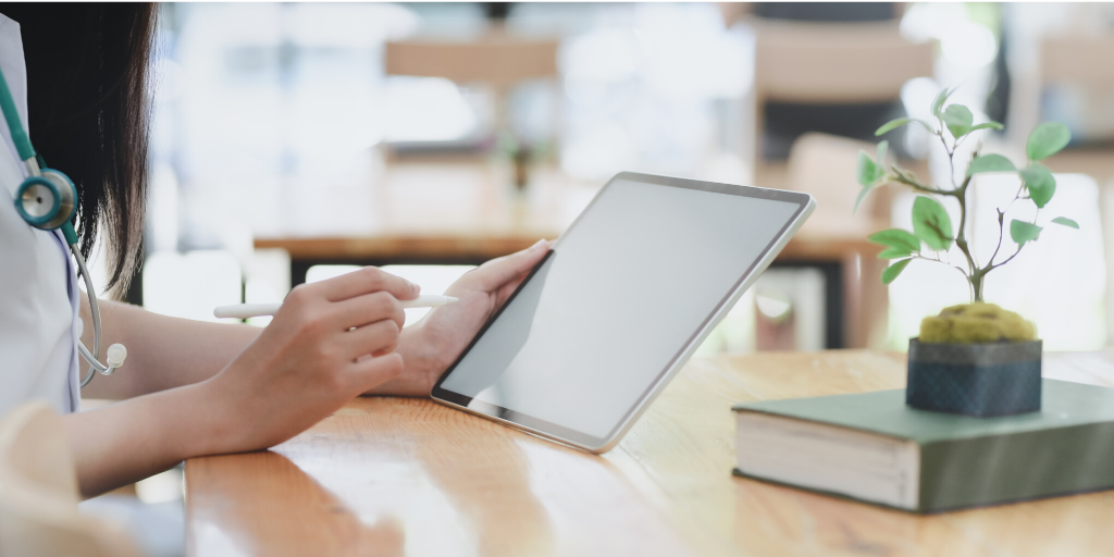 Nurse using tablet 